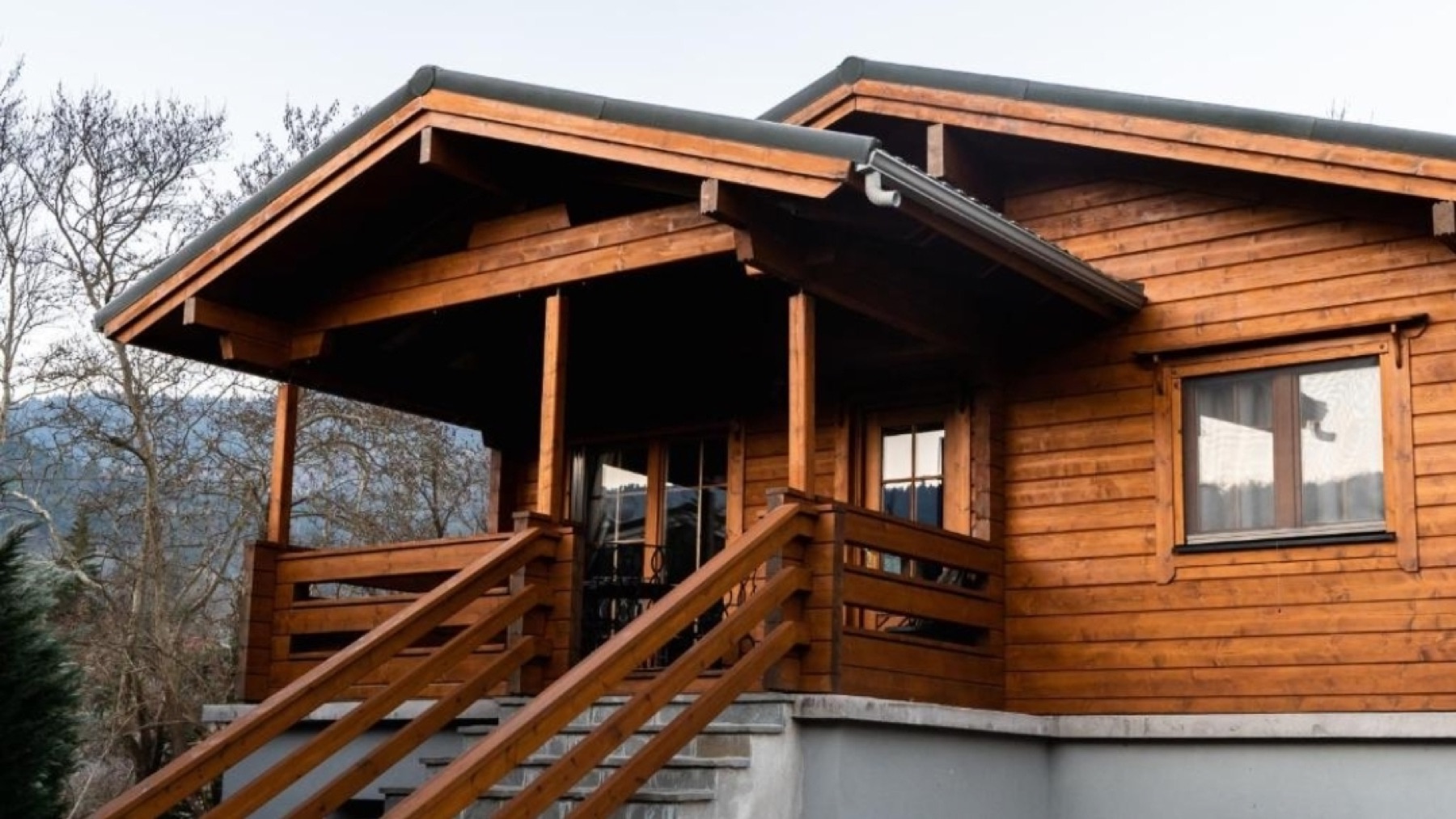 Riverside Forest Retreat Chalet — wooden forest chalet exterior in Karpenisi, Evrytania
